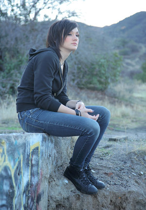 18 year old female boxer Sabrina Blond covers up her naked tits